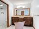 Spacious bathroom featuring a double vanity, walk-in shower, and elegant finishes for a luxurious feel at 42 Grenewood Ln, Haines City, FL 33844