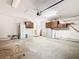 Garage with storage cabinets, a laundry room entrance, and utility connections at 42 Grenewood Ln, Haines City, FL 33844
