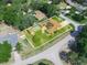 Aerial view of home, pool and solar panels highlighting the property line at 4333 Shadow Wood Way, Winter Haven, FL 33880