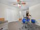 Bedroom featuring a sofa, two doors, and a drum set at 4333 Shadow Wood Way, Winter Haven, FL 33880
