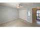 Cozy bedroom featuring neutral walls, carpet and a closet at 4480 Turnberry Ln, Lake Wales, FL 33859