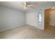 Cozy bedroom featuring neutral walls, carpet and a closet at 4480 Turnberry Ln, Lake Wales, FL 33859