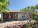 Inviting patio with outdoor seating, a well-maintained garden, and a picturesque view at 4480 Turnberry Ln, Lake Wales, FL 33859