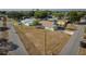 Spacious lot with cozy home, driveway, and mature trees at 4703 Benton St, Lake Wales, FL 33859