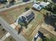 An aerial view of a home with a large lot bordered in red, showing the property lines at 4703 Benton St, Lake Wales, FL 33859