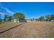 Wide shot of the backyard, fully ready for landscaping and customized to your preferences at 4703 Benton St, Lake Wales, FL 33859