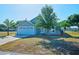 Charming single-Gathering home with a well-manicured front yard, showcasing its inviting curb appeal at 4703 Benton St, Lake Wales, FL 33859