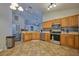 Spacious kitchen featuring stainless steel appliances, tile floors, and an open layout with good lighting at 4703 Benton St, Lake Wales, FL 33859