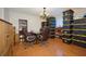 Versatile office space with laminate flooring, classic chandelier, and an abundance of storage opportunities at 4703 Benton St, Lake Wales, FL 33859