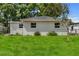 Lush backyard with a privacy fence, ideal for outdoor activities and relaxation at 4760 Holton Rd, Auburndale, FL 33823