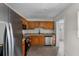 Spacious kitchen featuring stainless steel appliances and attractive cabinetry at 4760 Holton Rd, Auburndale, FL 33823