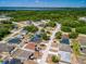 Aerial community view reveals home locations, nearby lake, and neighborhood layout at 500 Rio Grande Dr, Kissimmee, FL 34759