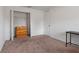 Bedroom featuring carpet, closet, dresser and desk at 500 Rio Grande Dr, Kissimmee, FL 34759