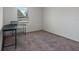 Bedroom featuring a desk and neutral carpet at 500 Rio Grande Dr, Kissimmee, FL 34759