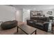 Spacious living room with a view of the kitchen, offering an open floor plan perfect for modern living at 500 Rio Grande Dr, Kissimmee, FL 34759