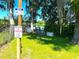 Private lake access for Little Lake Estates residents, with a no trespassing sign at 502 Little Lake Ct, Winter Haven, FL 33884