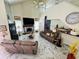 Spacious living room with high ceilings, fireplace, and modern flooring at 502 Little Lake Ct, Winter Haven, FL 33884