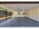 Spacious carport for parking, along with outdoor features and a lush backyard at 5829 Lake Breeze Ave, Lakeland, FL 33809