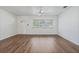 Bright living room boasting fresh paint and contemporary flooring at 5829 Lake Breeze Ave, Lakeland, FL 33809