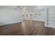 Spacious living area showcasing modern flooring and ample natural light at 5829 Lake Breeze Ave, Lakeland, FL 33809
