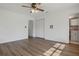 Spacious bedroom with modern flooring, two doors, and ample natural light at 5829 Lake Breeze Ave, Lakeland, FL 33809