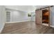 Large bedroom with wood floors, good natural light, and a custom closet with sliding barn doors at 6014 Crystal View Dr, Orlando, FL 32819