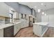 Contemporary kitchen featuring stainless steel appliances and a spacious island at 6014 Crystal View Dr, Orlando, FL 32819