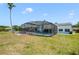 A great outdoor view featuring a screened pool, and a fully fenced in backyard at 6014 Crystal View Dr, Orlando, FL 32819