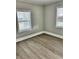 Cozy bedroom with ample natural light and neutral walls at 602 Nw 1St Ave, Mulberry, FL 33860