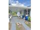 A long driveway leads to a covered parking area and the home's entrance at 602 Nw 1St Ave, Mulberry, FL 33860