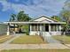 Charming single-story home with a covered carport and fenced yard at 602 Nw 1St Ave, Mulberry, FL 33860