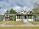 Charming single-story home with a covered parking area and welcoming front porch at 602 Nw 1St Ave, Mulberry, FL 33860