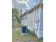 Shows the side of the house with visible AC unit at 602 Nw 1St Ave, Mulberry, FL 33860
