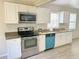 Bright kitchen featuring new appliances and stylish countertops at 602 Nw 1St Ave, Mulberry, FL 33860