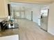 Open floor plan with kitchen flowing into the living area at 602 Nw 1St Ave, Mulberry, FL 33860