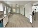 Open-concept living room with lots of natural light at 602 Nw 1St Ave, Mulberry, FL 33860