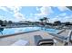 Resort-style pool with ample lounge seating for relaxing and enjoying the Florida sunshine at 6305 Bayberry Ne Blvd, Winter Haven, FL 33881