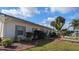 Well-maintained home with lush landscaping and curb appeal in a friendly community setting at 6305 Bayberry Ne Blvd, Winter Haven, FL 33881
