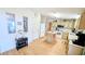 Functional kitchen featuring an island, ample counter space, light-colored cabinetry, and stainless steel appliances at 6305 Bayberry Ne Blvd, Winter Haven, FL 33881