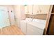 Laundry room featuring a washer and dryer at 6305 Bayberry Ne Blvd, Winter Haven, FL 33881
