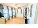 Bright living space with natural light, wood-look flooring, and plenty of room to relax or entertain at 6305 Bayberry Ne Blvd, Winter Haven, FL 33881