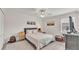 Serene bedroom featuring a comfortable bed, soft lighting, and warm, inviting decor at 6343 Torrington Cir, Lakeland, FL 33811
