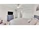 Spacious bedroom with a comfortable bed, closet, and neutral color palette for relaxation at 6343 Torrington Cir, Lakeland, FL 33811