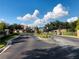 Gated community entrance with decorative landscaping at 6343 Torrington Cir, Lakeland, FL 33811