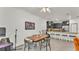 Dining area with view into the kitchen and a bar with seating at 6343 Torrington Cir, Lakeland, FL 33811