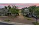 Charming two-story townhome with brick driveway, attached garages, and well-maintained landscaping at 6343 Torrington Cir, Lakeland, FL 33811