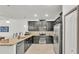 Well-equipped kitchen with dark cabinets, stainless steel appliances, and ample counter space at 6343 Torrington Cir, Lakeland, FL 33811