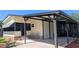 Carport area attached to a home with space for parking or outdoor seating at 6562 Chinaberry Ne Dr, Winter Haven, FL 33881