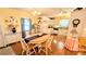Bright dining room open to the kitchen, perfect for entertaining guests at 6562 Chinaberry Ne Dr, Winter Haven, FL 33881