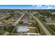 This aerial view shows a great neighborhood with mature landscaping and is close to the water at 7120 Summit Dr, Winter Haven, FL 33884